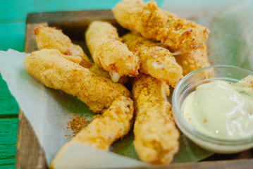 fried mozzarella cheese sticks breaded with sauce