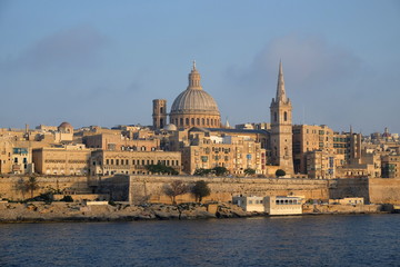 Fototapeta na wymiar Skyline of La Valletta, capital city of Malta, evening light, view from Sliema.