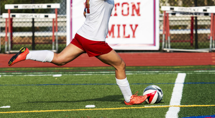 Winding up to kick a soccer ball