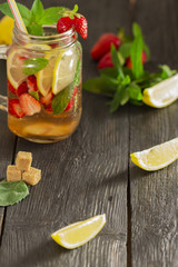 cocktail with fresh fruits, berries and mint