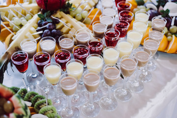 Exotic alcoholic cocktails. Fruit on the table
