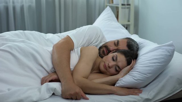 Husband catching wife cheating secretly chatting with lover on phone, infidelity