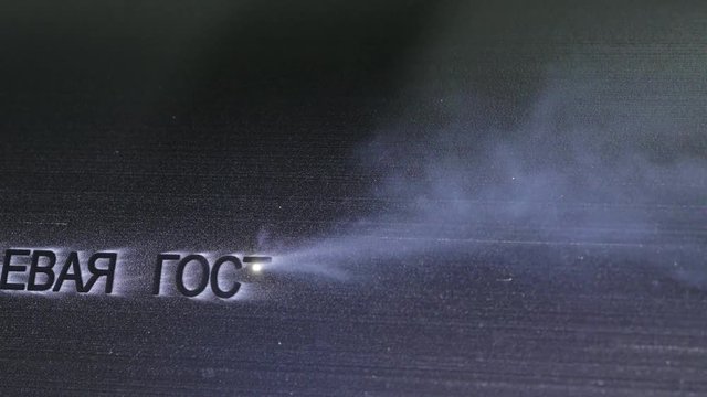 Laser Marking Machine Engraving. Manufacture of plastic water pipes of the factory. Process of making plastic tubes on the machine tool with the use of water and air pressure.