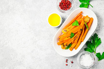 Garlic honey roasted carrots.Top view, space for text.