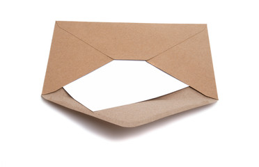 craft paper envelope with a blank  for mail post isolated on the white