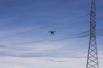 Drone inspections for Solar Energy and High Voltage Lines. Operator and screen review