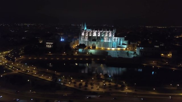 Aerial fottage of Catedral de Santa Maria de Palma de Mallorca at night
