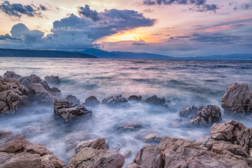 Colorful scenery of beach during sunset. Long exposure