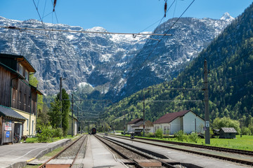 Train through the Alps villages Hallstat in Austria