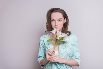 Woman with a flower. Woman on white background.