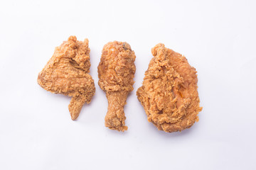 Delicious hot and crispy fried chicken isolated on a white background