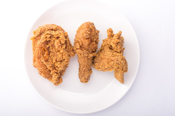Delicous hot and crispy fried chicken isolated on a white background