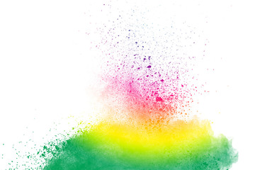 Abstract multi color powder explosion on white background.  Freeze motion of  dust  particles splashing. Painted Holi in festival.