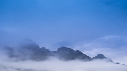 Mountain in Laos surrounded by mist