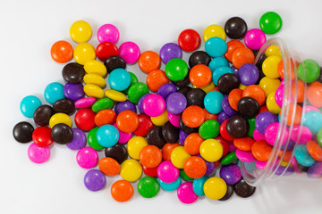 Fototapeta na wymiar colorful sweet circle shape . sugar yummy balls candy in box on white background . 