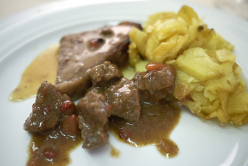 Roasted podolica meat with roasted potatoes