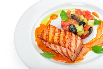 Grilled salmon fillet isolated on white.