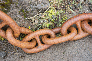 Closeup big rusty chain links. Closely and inseparably connected