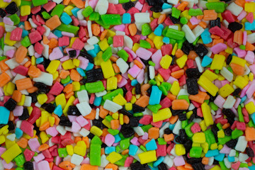Fototapeta na wymiar colorful sweet square shape . sugar yummy candy background . 