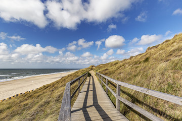 View from Wooden Boardwalk at Wenningstedt towards Beach with the North Sea at Sylt / Germany