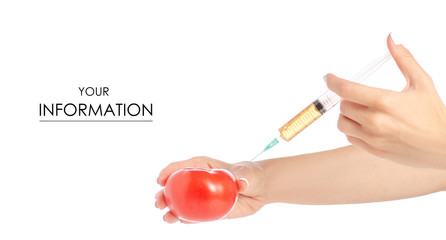 Syringe in the hands of tomato pattern on a white background isolation