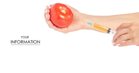 Syringe in the hands of tomato pattern on a white background isolation