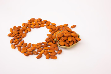 almolds in cups on white background.