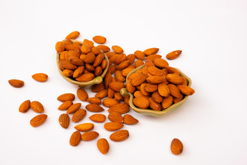 almolds in cups on white background.