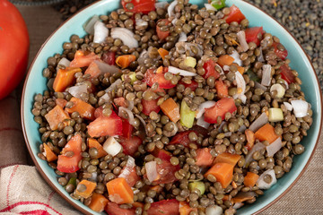 fresh lentil salad with tomatoes and onions