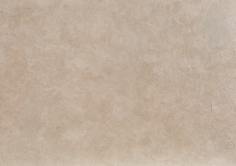 Close-up surface detail of old rough white plaster wall texture, macro.