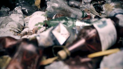 Piles of disgusting garbage polluting soil and forests, environmental problem