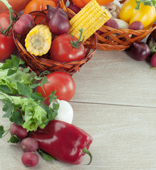 frame of fresh vegetables on a wooden background
