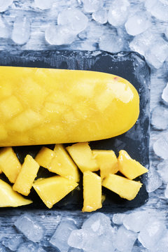 homemade natural pineapple or mango ice pop