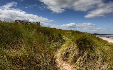 Bamburgh Castle from the beach and dunes