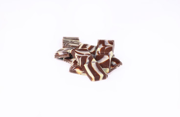 slices of original black and white chocolate.isolated on white