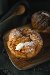 Braided bread on rustic background