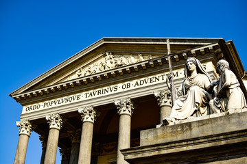 View from below of the sculpture that presides over the Catholic Parish Church Gran Madre Di Dio located on the other side of the river in the center of the city. Photograph taken in Turin, Italy.