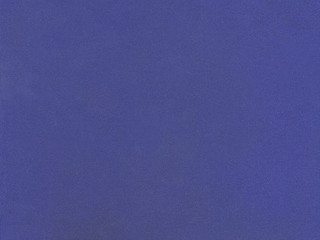 Grain dark blue paint wall background or texture