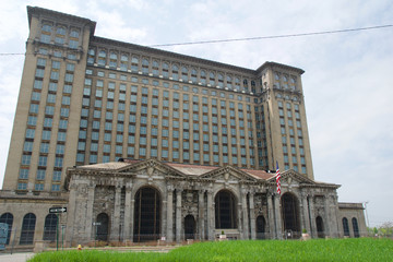 Fototapeta na wymiar DETROIT, MICHIGAN, UNITED STATES - MAY 5th 2018: A view of the old Michigan Central Station building in Detroit which served as a major railway depot from 1914 - 1988