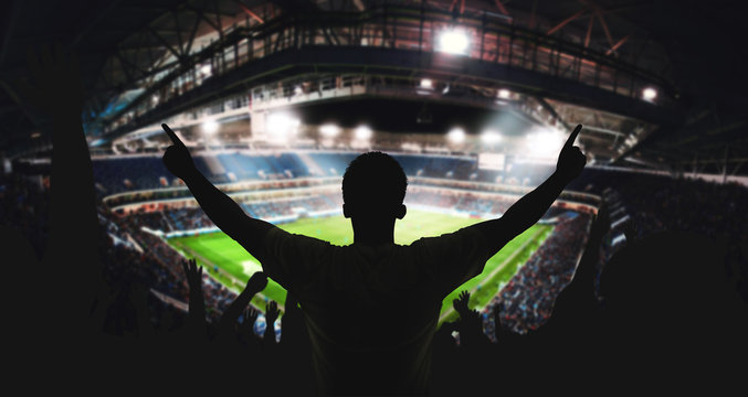 Fototapeta Fans im Fussball Stadion