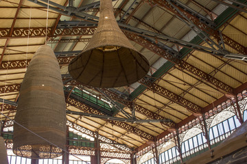 Mercato Centrale in Florence, looking up at the rooftop with pening lamps