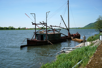 One of the last big professional fishermen ships on the Danube near Regensburg in Germany
