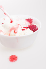 Vanilla ice cream and raspberries