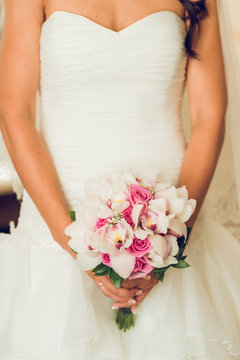 Bride holding wedding bouquet