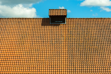 Background of roof with red brick tiling texture