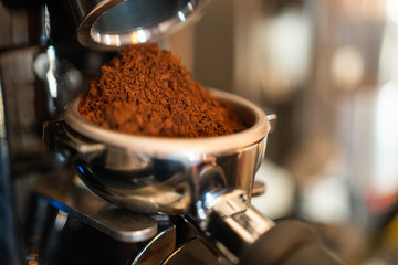 Grinding fresh coffee beans