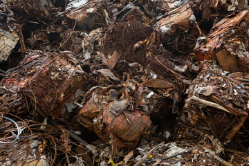 Closeup of scrap metal bales bundled for recycling ,old steel,