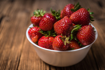 Red strawberry in a bowl