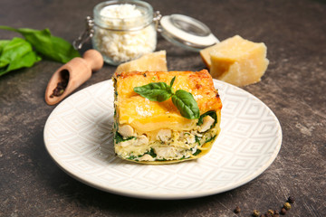 Lasagna with spinach on table