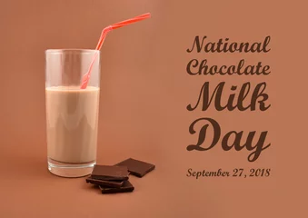 Deurstickers Milkshake National Chocolate Milk Day illustration. Chocolate milk with chocolate pieces. Glass of chocolate milk on a brown background. Important day